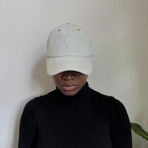 Vintage baseball‎ cap with orange stitching in light blue